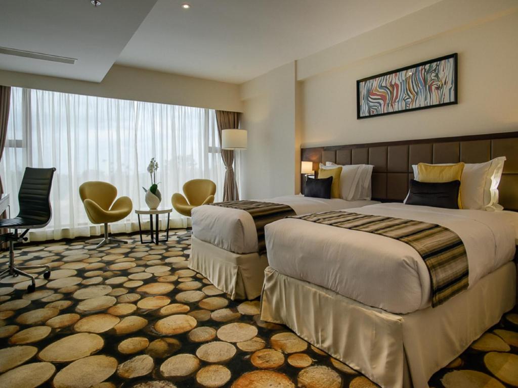The Concord Hotel & Suites